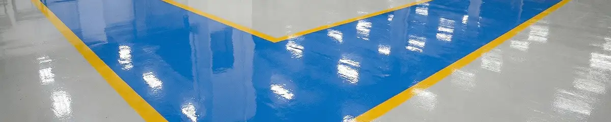 A factory floor professionally covered and marked with epoxy flooring in Santa Ana, CA