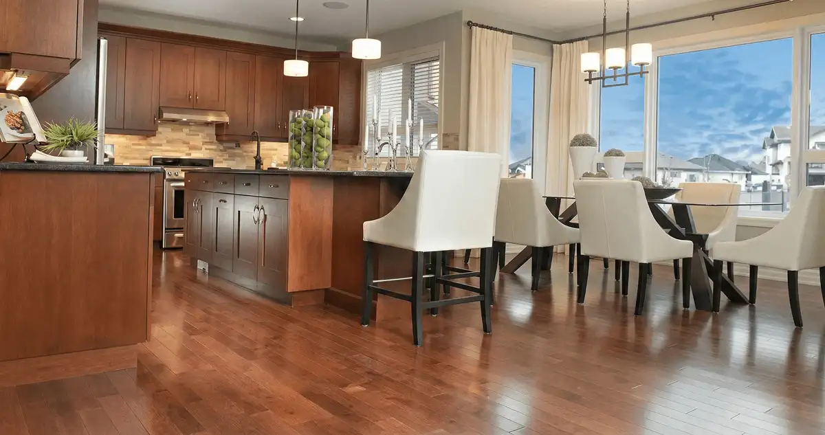 A modern kitchen with professionally installed wood flooring in Santa Ana, CA