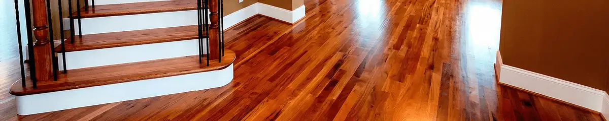 Base floor of a staircase with professionally restored wood flooring in Santa Ana CA