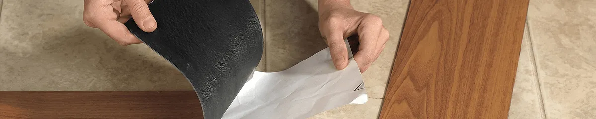 A professional installing vinyl flooring in Santa Ana, CA